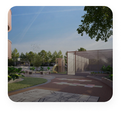 image of a paved walkway with cricket net on right, childern play area on left, and trees in the background